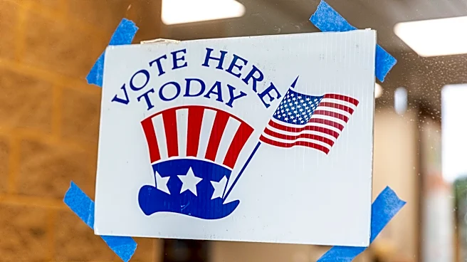 The Latest: Michigan Democratic Senate primary is test between progressives and the establishment