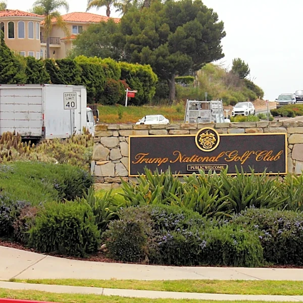 Authorities say a man carrying ammo was monitoring security at Trump golf course near LA