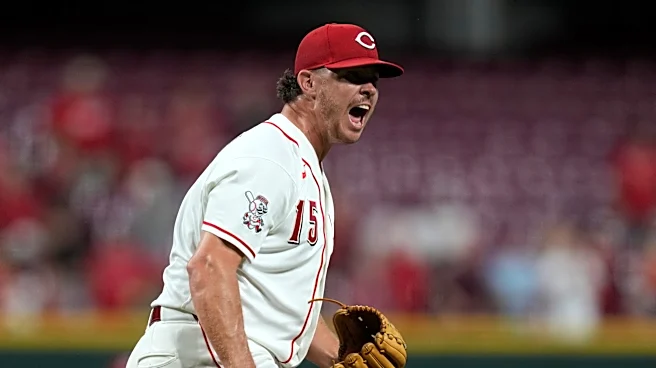 McLain homers to back Lowder in the Reds' 3-2 victory over the A's