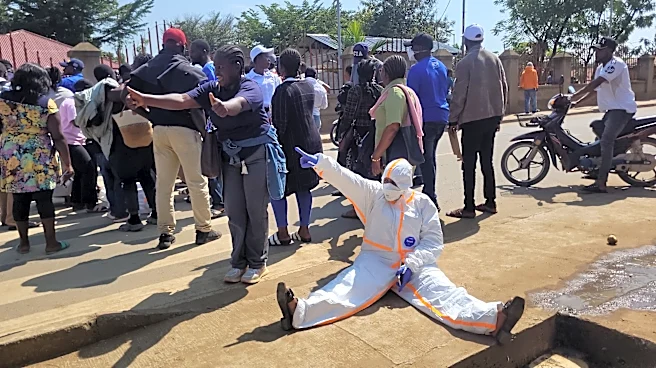 Congo monitors nearly 200 boat passengers after a traveler dies with Ebola-like symptoms