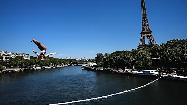 High divers take the plunge in the Seine in a new test of Paris’ reclaimed river