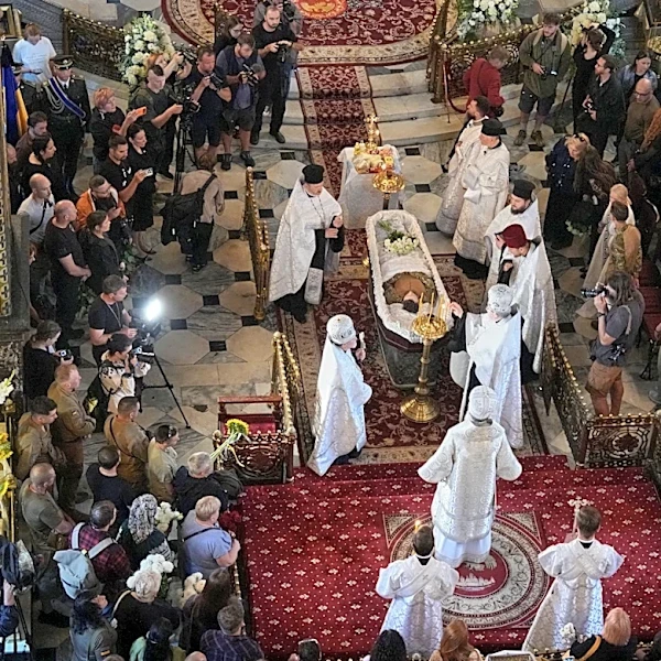 Ukraine honors its 'collector of souls' killed while recovering the war dead