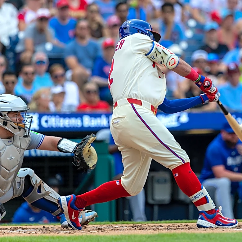 Schwarber hits 2 HRs, Hill delivers RBI single in 12th inning as Phillies beat Blue Jays 7-6