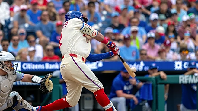 Schwarber hits 2 HRs, Hill delivers RBI single in 12th inning as Phillies beat Blue Jays 7-6