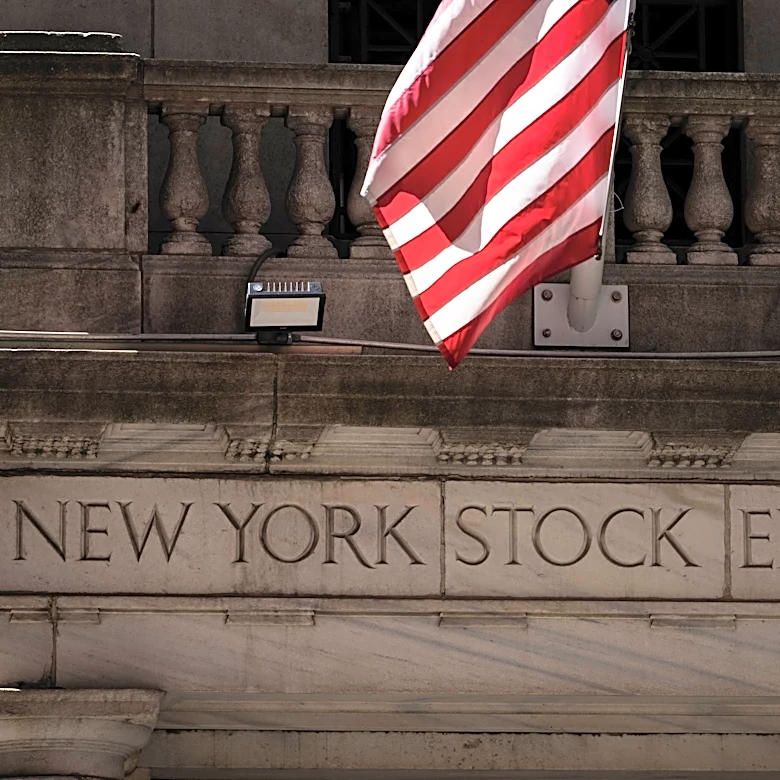 Wall Street slips away from its all-time high as oil prices keep swinging