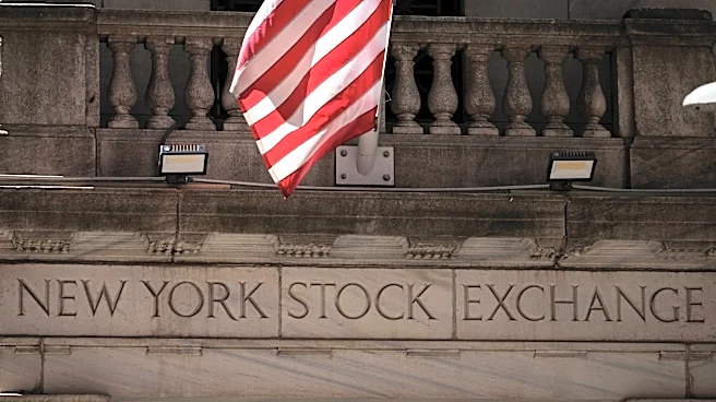 Wall Street slips away from its all-time high as oil prices keep swinging