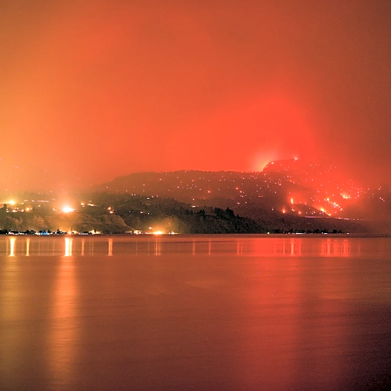 British Columbia wildfire that has forced 20,000 to flee grew overnight, officials say