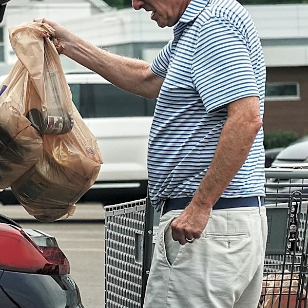 Inflation cooled last month as gas prices fell, though costs remain elevated