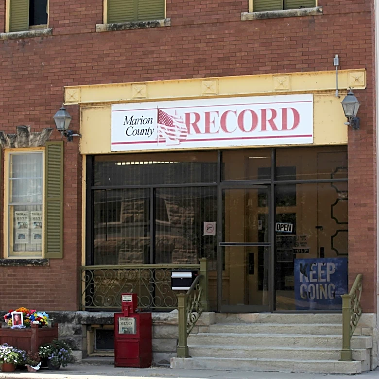 A Kansas town will pay $850K to end a reporter's lawsuit over a 2023 raid on her paper's offices