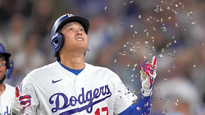 Homers from Ohtani and Betts power Dodgers to a 4-2 victory and a sweep of the Royals