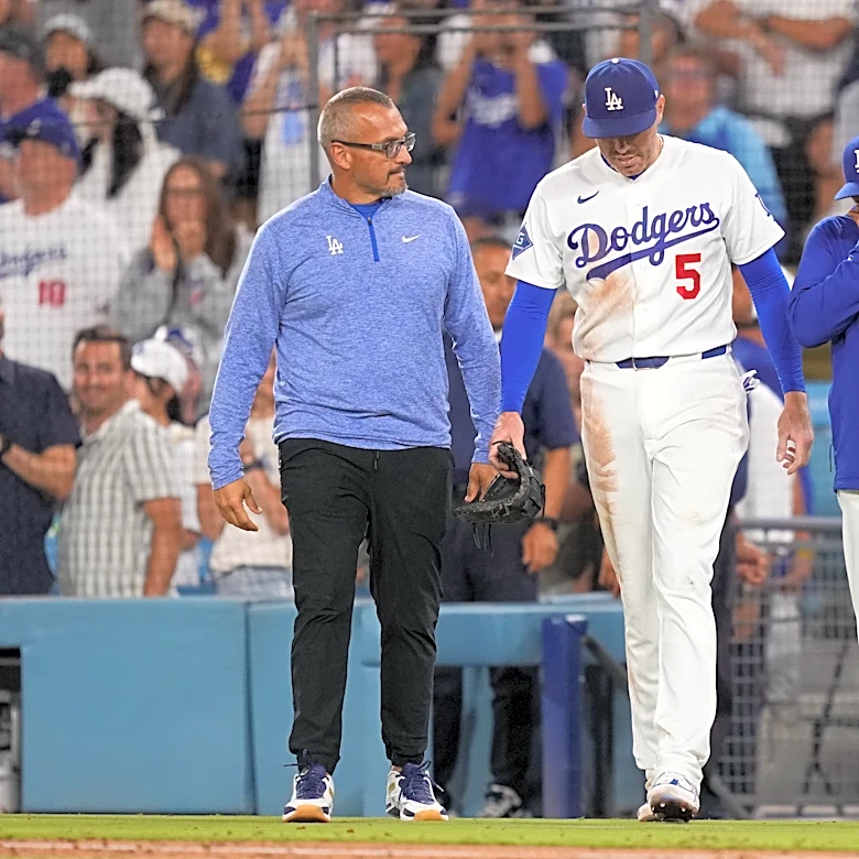 Dodgers' Freddie Freeman somehow avoids serious injury in frightening fall into visitors' dugout