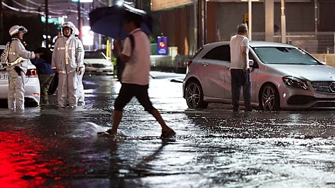 Torrential rain near Tokyo causes flooding and paralyzes traffic, killing 1