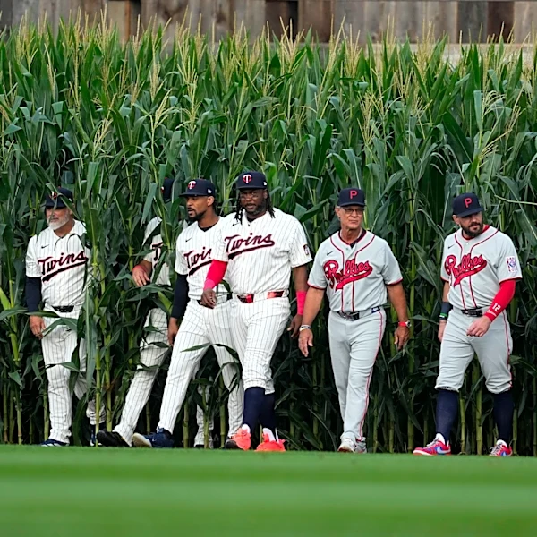 Field of Dreams becomes the Hall of Fame, as 26 members come out of the corn for Phillies-Twins game