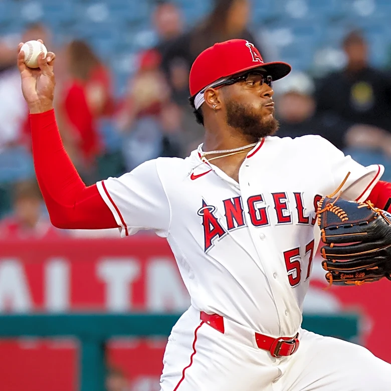 Ureña pitches Angels past Rangers 7-0 as Trout and Guzman lead offense with 3 hits apiece