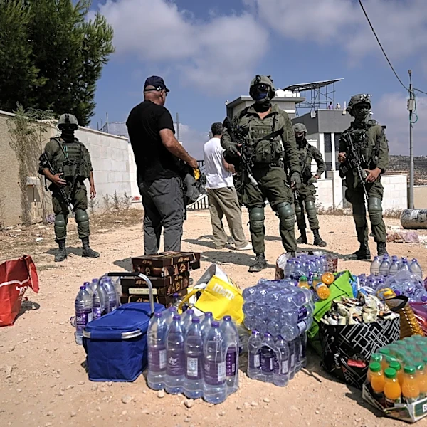 Palestinians besieged in West Bank village fear Israeli settlers will seize their homes