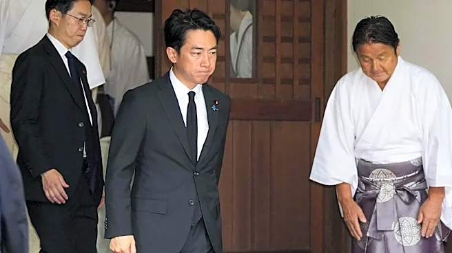 Japan's defense chief visits shrine neighbors see as symbol of Japanese militarism