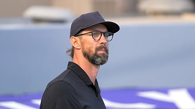Michael Phelps returns poolside with his sons as 8-year-old Beckett eyes swimming