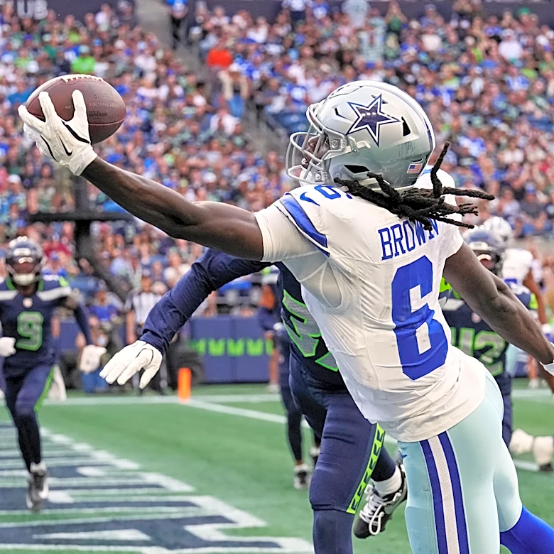 Brown stands out for Cowboys with 2 TD catches in 17-7 win over Seahawks