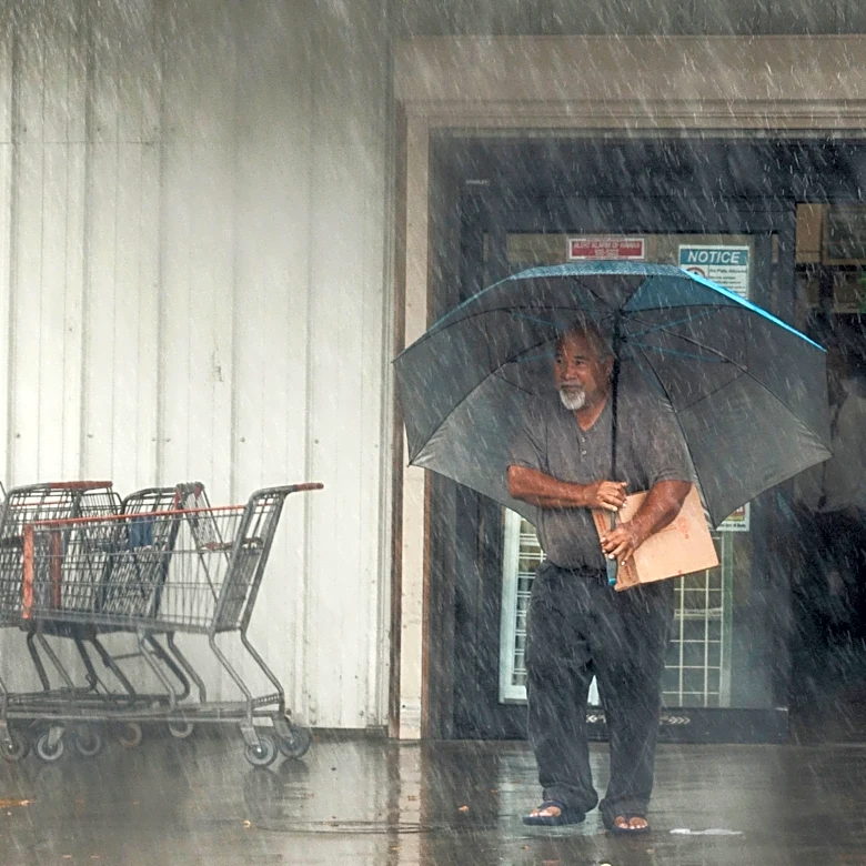 Lala is again a tropical storm, sending drenching rain and winds across the Hawaiian islands