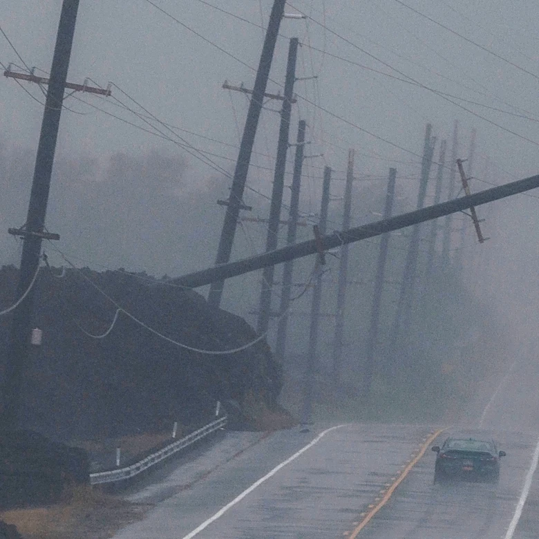 Lala is again a tropical storm, sending drenching rain and high winds across the Hawaiian islands