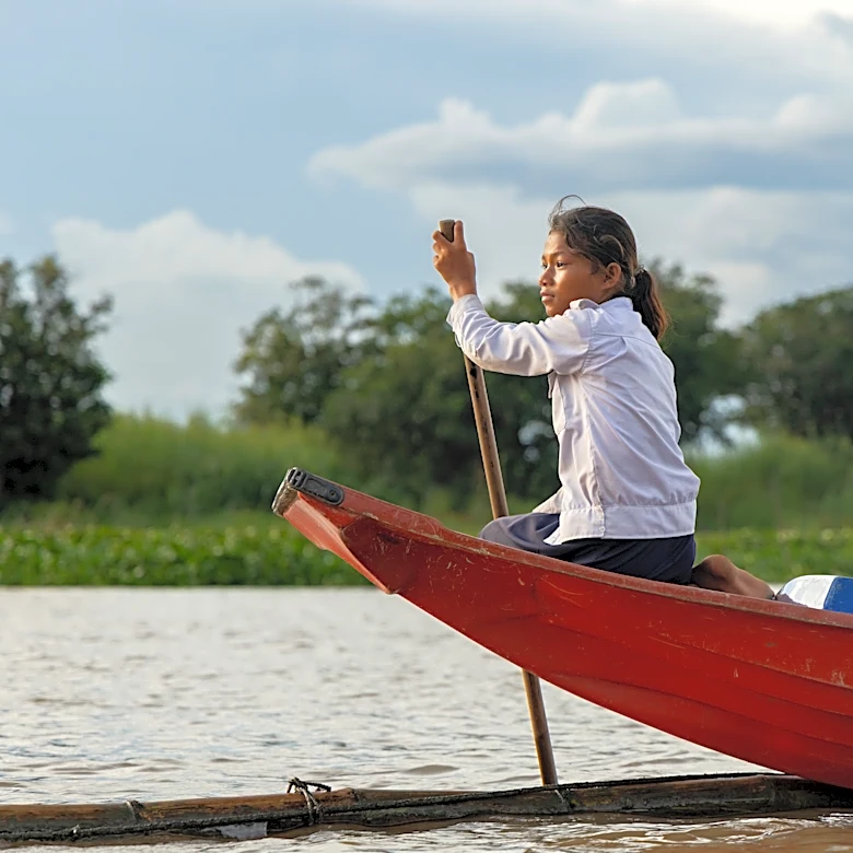 Photos show Cambodian children attend school in floating villages along the Tonle Sap lake.