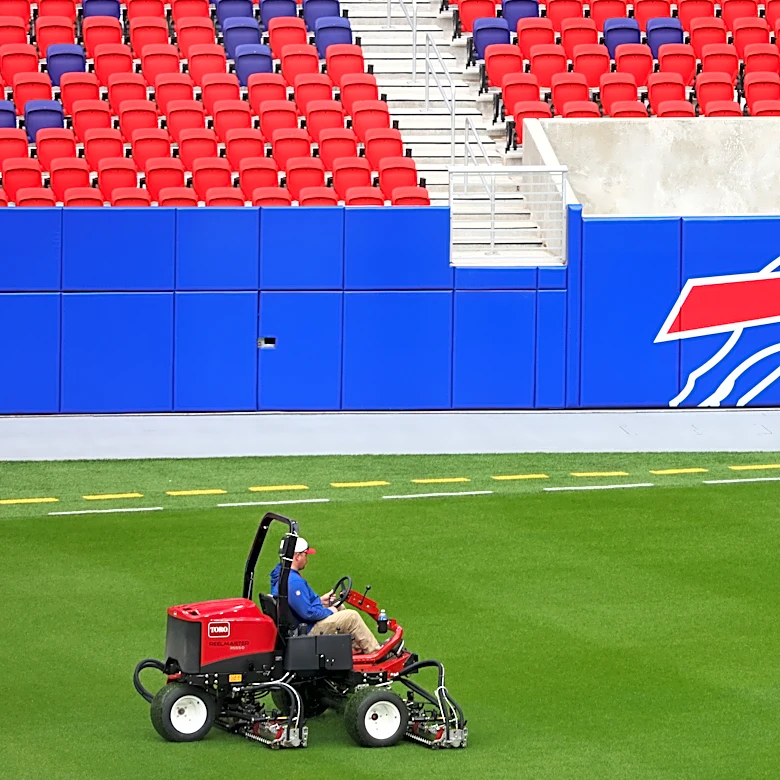Bills president tells AP new grass field held up well despite a few divots in preseason opener