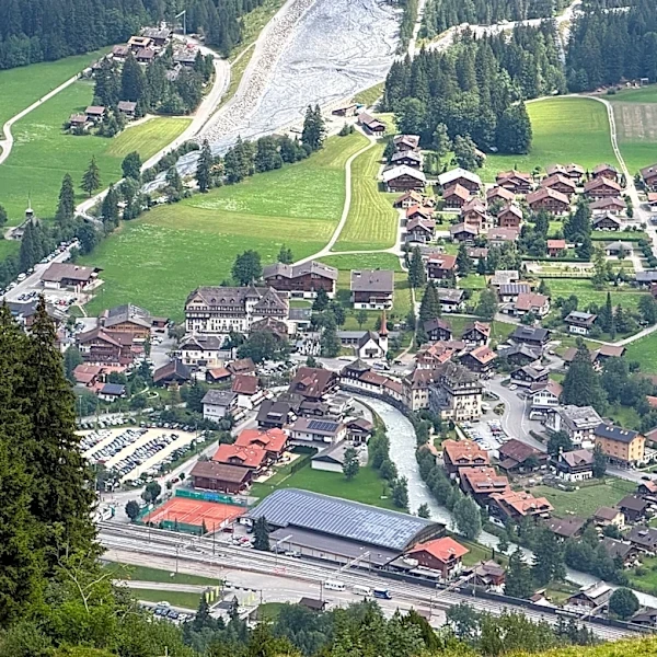 A looming rock collapse threatens a Swiss village as thawing permafrost destabilizes the Alps