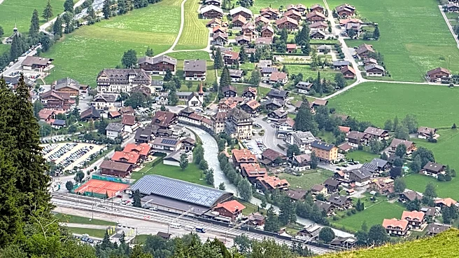 A looming rock collapse threatens a Swiss village as thawing permafrost destabilizes the Alps