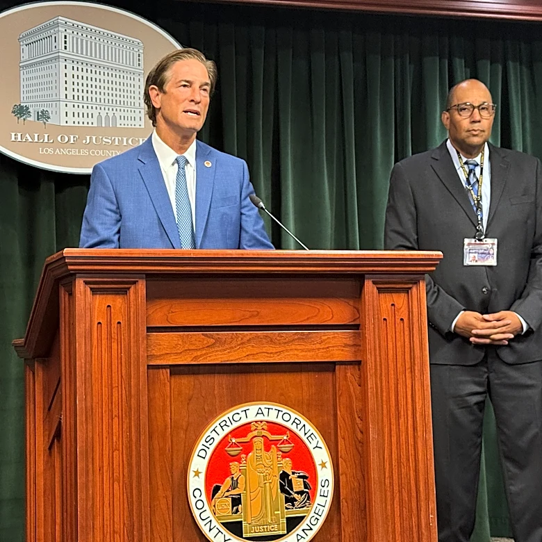 Los Angeles DA, criticized for charging officer who taped others making racist remarks, drops felony