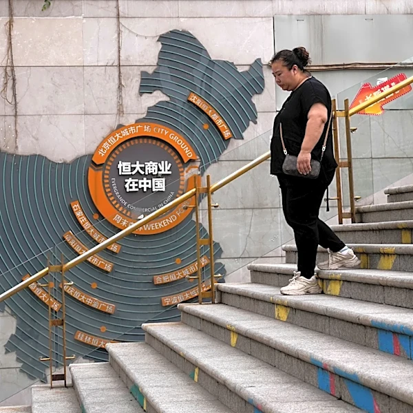 Chinese court sentences founder of troubled property developer Evergrande to life in prison