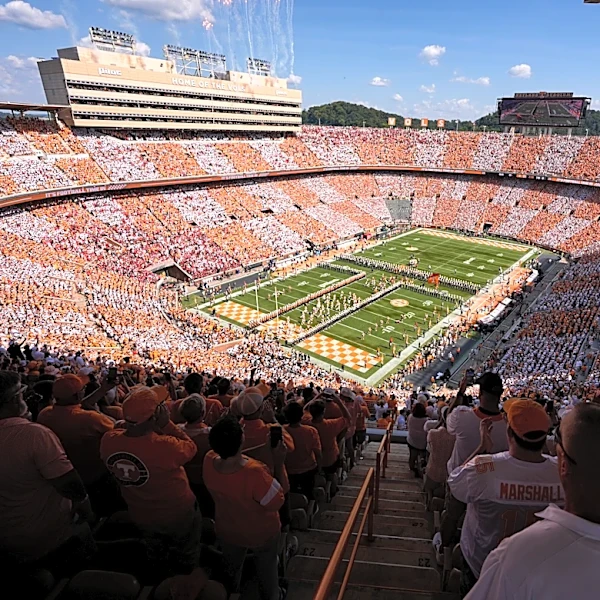 The playbook for college sports revenue is expanding from logos and fees to entertainment districts