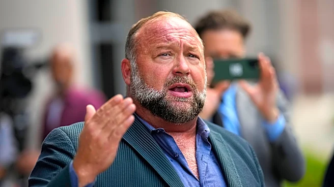 Court cuts $50M judgment against Alex Jones over falsely labeling Sandy Hook killings a hoax