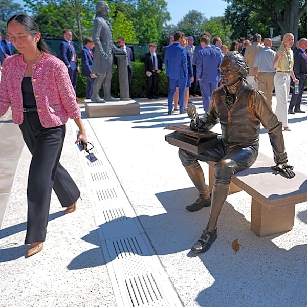 Inside Trump's remake of the White House Rose Garden. First a stone patio, then statues