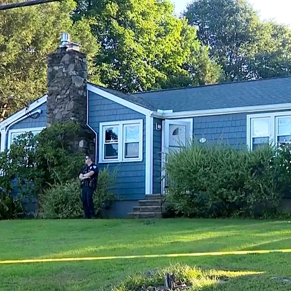 Arrest warrant issued for Massachusetts woman sought in officer's death