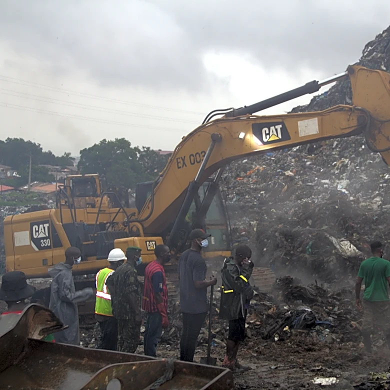 A landslide at a landfill in the capital of Guinea kills 30 people, officials say