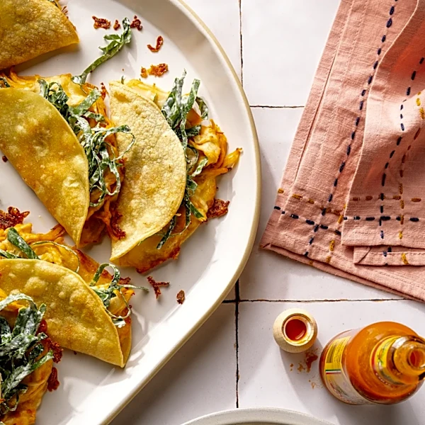 How to make crispy Buffalo chicken tacos with collard slaw and a protein-packed ranch dressing