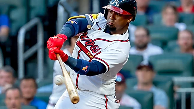 Albies drives in winning run in the 8th, Braves win 4-3 to snap Dodgers 6-game winning streak.