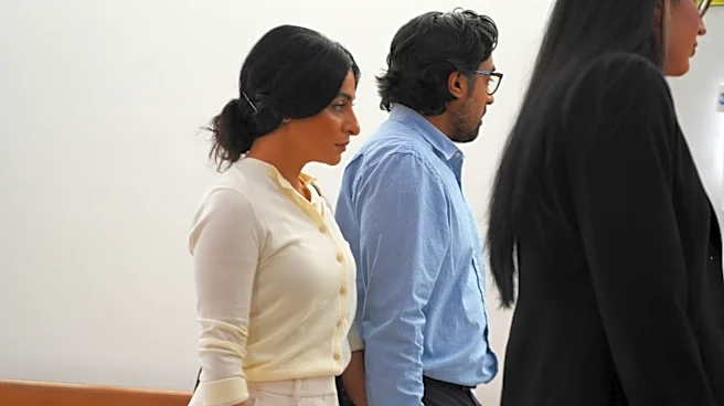 California couple face their surrogate in emotional Texas hearing as dispute over newborn escalates
