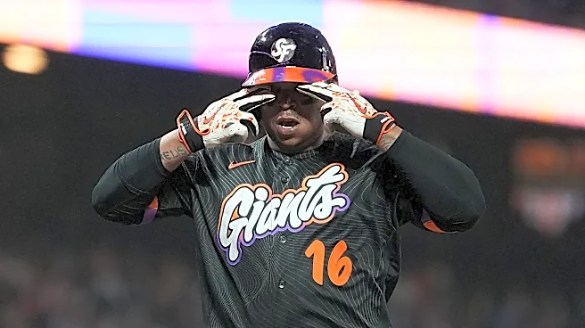 Rafael Devers bounces a homer into McCovey Cove as Giants beat Reds 3-1