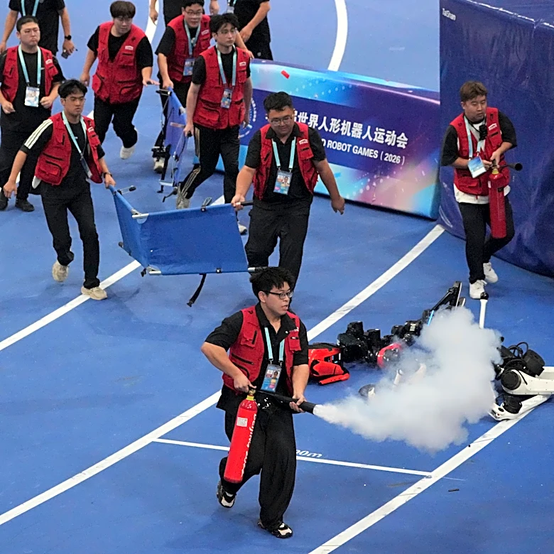 A robot sprinter shatters a 100-meter record again as sparks fly at China’s robot competition