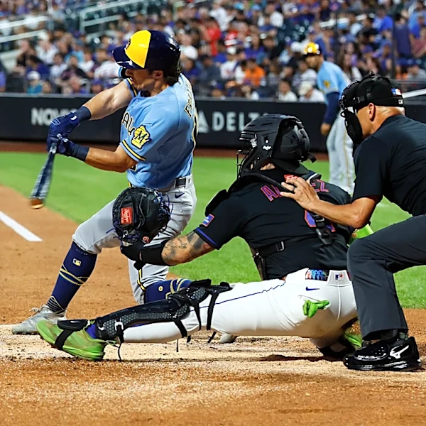 Brewers overcome Dustin May's early injury to rout the Mets 8-1