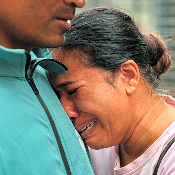 Rescuers retrieve flood survivors caked in mud as death toll in Nepal-China border disaster climbs