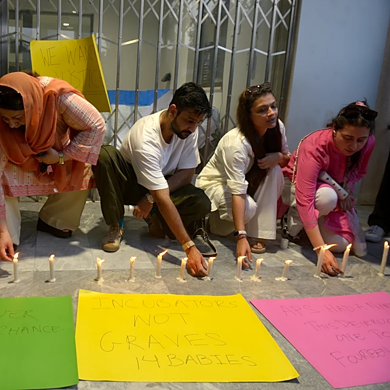 8 officials suspended after probe into Pakistan hospital fire that killed 14 newborns