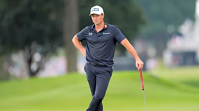 Hovland surges to a 1-shot lead at Tour Championship with cast of challengers lined up behind him