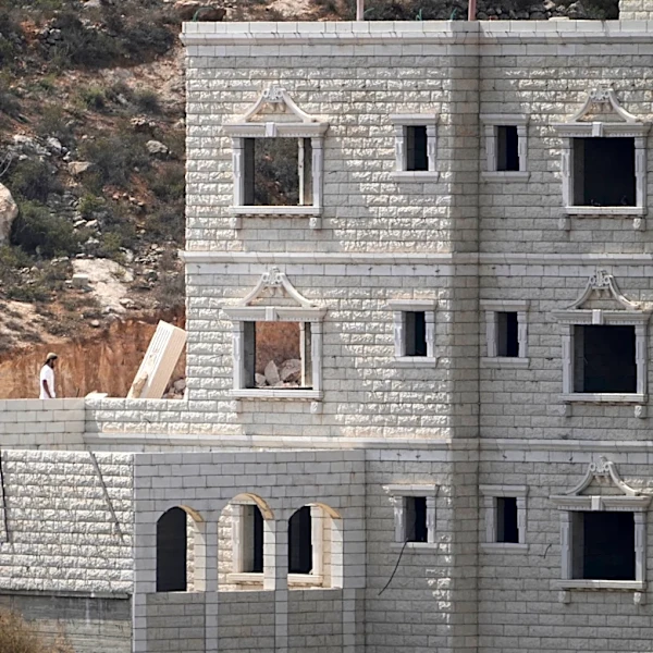 Iran's leader calls for Muslim unity, NBC crew attacked in West Bank and other Mideast news
