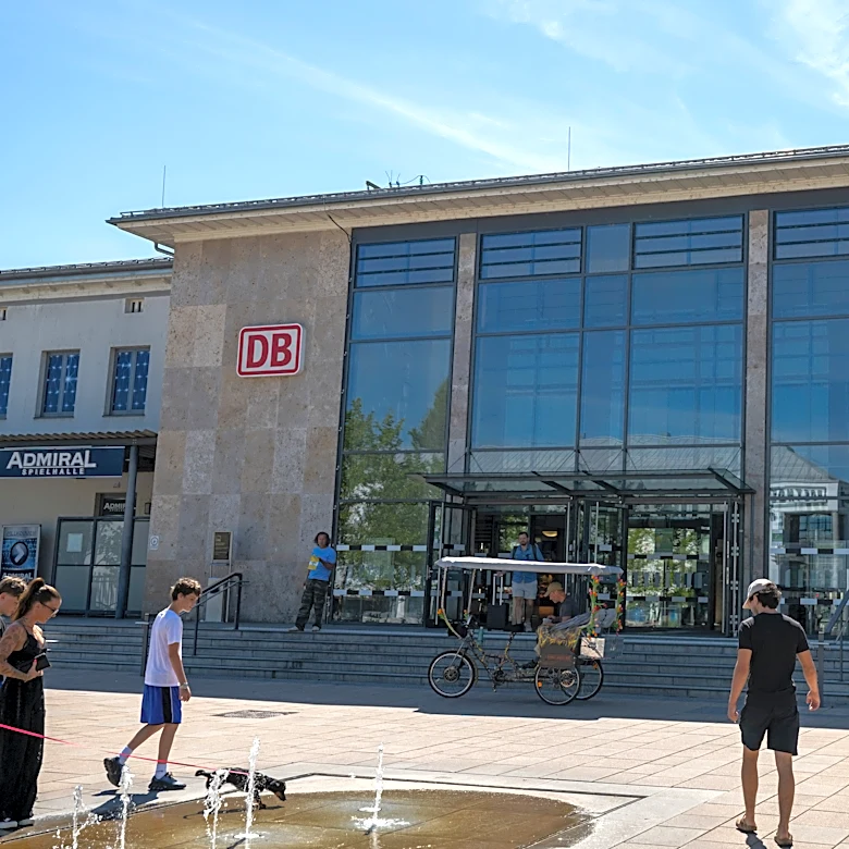 A British woman is fatally stabbed at a station in Germany. Police detain a suspect