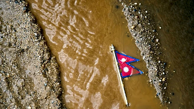 Rescuers comb through mud and debris as Nepal-China floods leave more than 1,000 dead