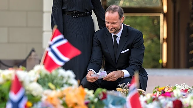 Norway's King Haakon pledges an oath of allegiance to the constitution as his father lies in state
