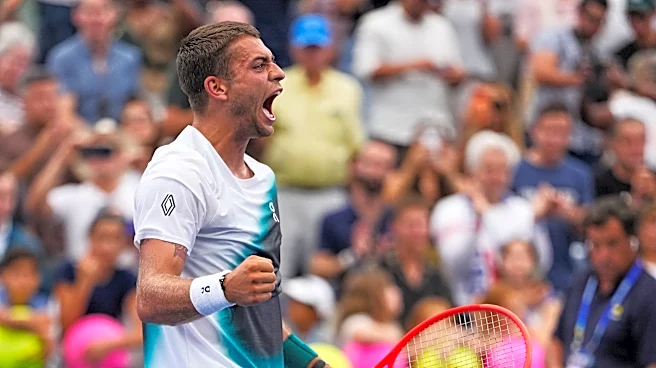 No. 5 Cobolli rallies from two sets down at the US Open as play picks up after a morning of rain