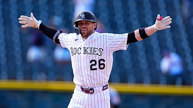 Brett Sullivan's 2-run single in the 11th lifts the Rockies to a 6-5 win over the Orioles